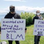 Photo by Kira Erickson/Whidbey News Group                                Visitor Tayven Lewis from Arizona joined the protest this week with his grandfather, Richard Draves.