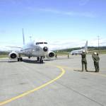 U.S. Navy photo by Mass Communicaton Specialist 2nd Class Jakoeb VanDahlen                                Sailors with VP-40 at Naval Air Station Whidbey Island place chocks under a P-8A Poseidon aircraft. VP-40 is the final active duty squadron to transition from the P-3C Orion aircraft to the P-8A Poseidon. VP-40 completed its transition 14 May 2020 on Naval Air Station Whidbey Island. The P-8 , a modified Boeing 737-800ERX, is an anti-submarine warfare, anti-surface warfare aircraft.
