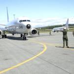 U.S. Navy photo by Mass Communicaton Specialist 2nd Class Jakoeb VanDahlen                                Sailors with VP-40 at Naval Air Station Whidbey Island place chocks under a P-8A Poseidon aircraft. VP-40 is the final active duty squadron to transition from the P-3C Orion aircraft to the P-8A Poseidon. VP-40 completed its transition 14 May 2020 on Naval Air Station Whidbey Island. The P-8 , a modified Boeing 737-800ERX, is an anti-submarine warfare, anti-surface warfare aircraft.