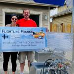 Doug and Julianne Blynn from Boston bought the hotdog stand on June 11. Photo provided