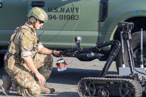 Lt. Nick Woods, attached to Explosive Ordnance Disposal Mobile Unit (EODMU) 5, controls a Mark II Talon remotely operated vehicle (ROV) during a Certification Exercise (CERTEX) on Naval Air Station Whidbey Island, Wash., July 16. Elements of EODMU-1 and EODMU-5 qualified as ready for future operational deployments during the CERTEX, which centered on integrating the two units Sailors with a goal of building a cohesiveness that will help them counter undersea threats and contribute to winning the high-end fight once deployed in support of Navy and geographic combatant command mission priorities. U.S. Navy EOD is the worlds premier combat force for eliminating explosive threats so the Fleet and nation can fight and win wherever, whenever and however it chooses. U.S. Navy photo by Mass Communication Specialist 2nd Class Marc Cuenca/Released
