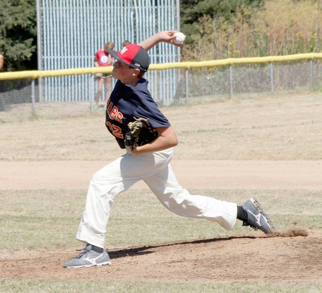 Grady Davis delivers a pitch for the Crabs Saturday. (Photo by Jim Waller/Whidbey News-Times)