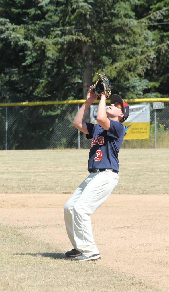 The Crabs Liam Petty settles under a pop-up Saturday.(Photo by Jim Waller/Whidbey News-Times)