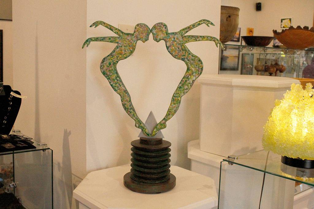 Photo by Kira Erickson/Whidbey News Group                                Morgan Bell often uses recycled items in her art. This piece uses a part from a tractor.