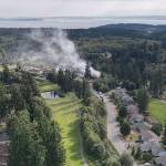 Using garden hoses, neighbors help fight fire