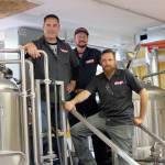 Photo by Jessie Stensland / Whidbey News-Times
Marc Aparicio, Kyle Magnuson and Erickson Adam make up Penn Cove Brewings three-person brewing crew.