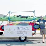 Steve Adams operates a mobile kayak and stand-up paddleboard business and often parks his trailer on Pioneer Way. Photo by Emily Gilbert/Whidbey News-Times.