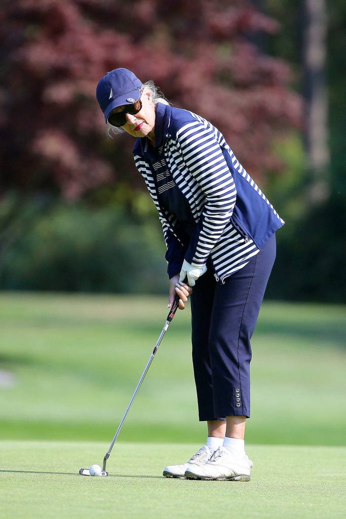 Monique Franssen gets ready to putt last week. Franssen posted the tournaments top net score. (Photo by John Fisken)