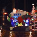 An unexpected pairing of Baby Yoda and Santa in a jet plane are the stars of this homes Christmas display, located just off of Southwest Swantown Avenue in Oak Harbor. Photo by Emily Gilbert/Whidbey News-Times