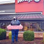 April DiDonna has been telling customers she loves them since October. Its been reciprocated 2,549 times. Photo by Emily Gilbert/Whidbey News-Times