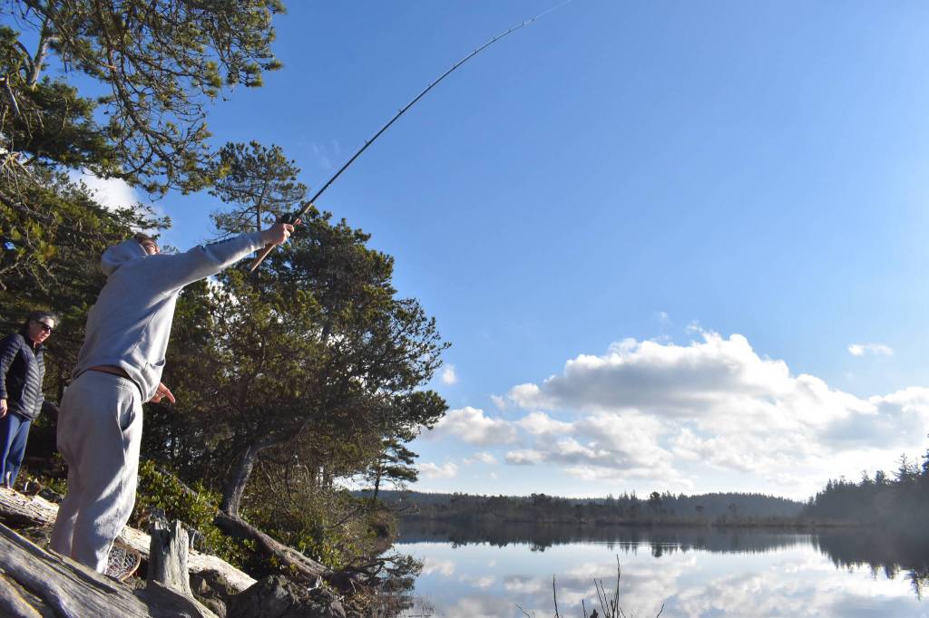 Aiden Santos of Anacortes fishes at Cranberry Lake at Deception Pass State Park last Saturday. The Navy included the park as one of its proposed training sites. Photo by Emily Gilbert/Whidbey News-Times