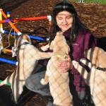 Summit Assistance Dogs breeds and trains dogs to become mobility service dogs. Each litter is named with a specific letter  the most recent litter includes Nelson, Nugget, Neela and Nali. Three of the puppies are seen here with founder Sue Meinzinger. Photo by Emily Gilbert/Whidbey News-Times