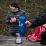 Joe Hempel laughs as passersby ask about what they are doing Jan. 29 while hot tea is passed around in Langley. (Olivia Vanni / The Herald)