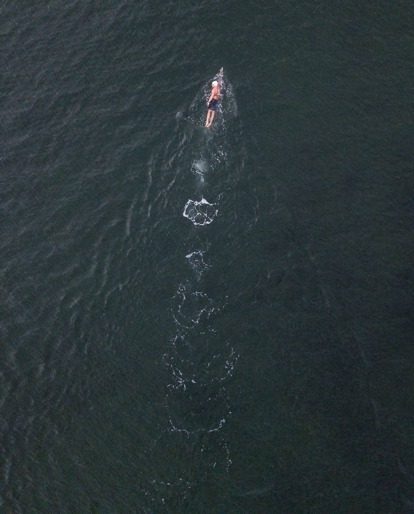 Joe Hempel swims in Saratoga Passage off the shore of Langley on Whidbey Island. (Olivia Vanni / The Herald)