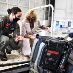 Photo by U.S. Navy Photo by Mass Communication Specialist 3rd Class Aranza Valdez
Lt. Cate Oakley shows an aircraft to First Lady Dr. Jill Biden at Naval Air Station Whidbey Island March 9, 2021. Dr. Biden visited the base to show support for military members and their families, and talk about the Joint Forces Initiative.