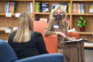 U.S. Navy Photo by Mass Communication Specialist 3rd Class Aranza Valdez
First lady Dr. Jill Biden speaks with a Fleet and Family Support Center life consultant during her visit to Naval Air Station Whidbey Island Tuesday, March 9. Biden visited the base to show support for military members and their families, and talk about the Joint Forces Initiative.