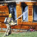 Multiple agencies responded to a house fire on Swantown Road in Oak Harbor Friday morning. North Whidbey Fire and Rescue Chief John Clark said the cause is still under investigation, but did not appear to be suspicious. Photo by John Fisken