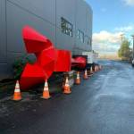 The Angel de la Creatividad sculpture is currently bright red and being stored on its side at a construction companys property in Bellingham. Oak Harbor City Council members have not voted on whether to accept the gift of the art yet. Photo provided