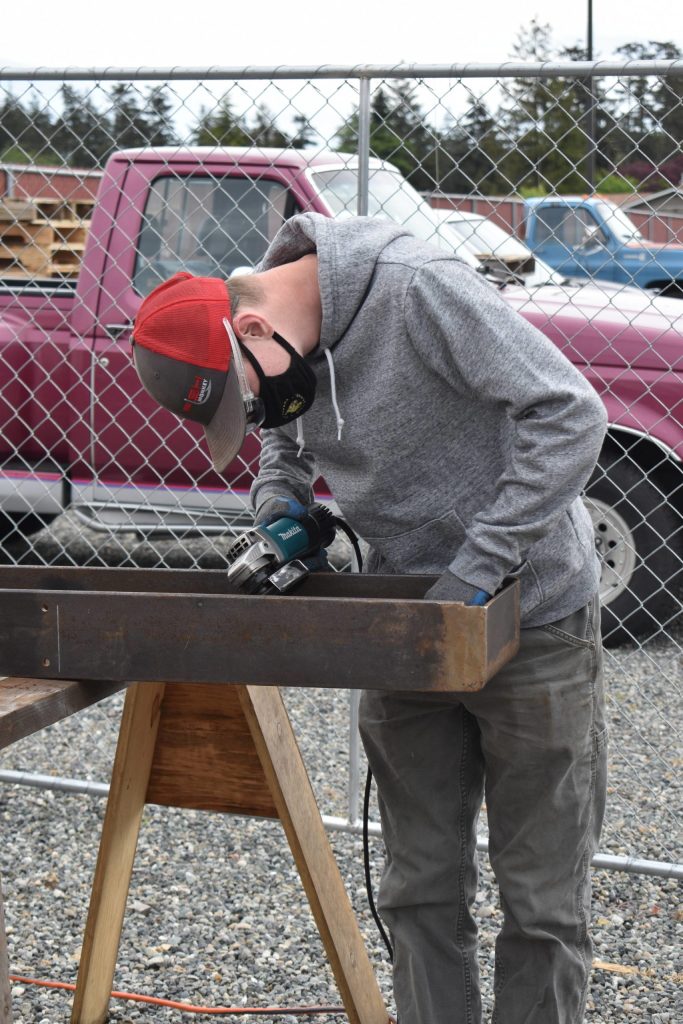 Photo by Emily Gilbert/Whidbey News-Times Senior Aaron Draszt looking at a project during an advanced engineering class.