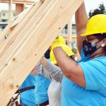Photo by Emily Gilbert/Whidbey News-Times
Brittany Darby helps raise a wall at Habitat for Humanity of Island Countys two townhomes on Southeast 10th Avenue in Oak Harbor during the Women Build event Saturday.