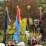Rear Admiral William J. McDaniel speaks.