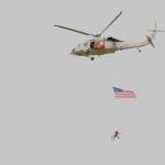 H-60 Search and Rescue does a flyover following the service.