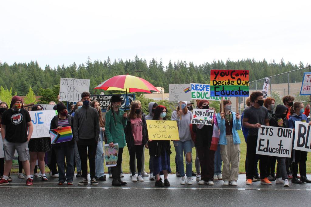 Student counter-protesters brave the dreary weather to stand up for their right to have a voice in their own education. (Photo by Karina Andrew/Whidbey News-Times)