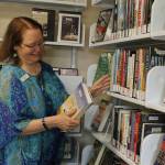 Photo by Kira Erickson
Debby Colfer, the first and so far only manager of the Clinton Library, will be retiring June 25 after a 23-year career with Sno-Isle Libraries. Patrons remember her for her choice in all-ages programming and the selection of books she brought to Clintons tiny shelves.