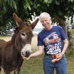 Photo by Kira Erickson
Gary Gabelein, this year's grand marshal of the Whidbey Island Fair parade, with his donkey, Cleopatra.