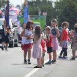 Kids line up, eager to stuff their pockets with candy. (Photo by Karina Andrew/Whidbey News-Times)