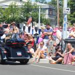 The crowd watches the parade pass by. (Photo by Karina Andrew/Whidbey News-Times)