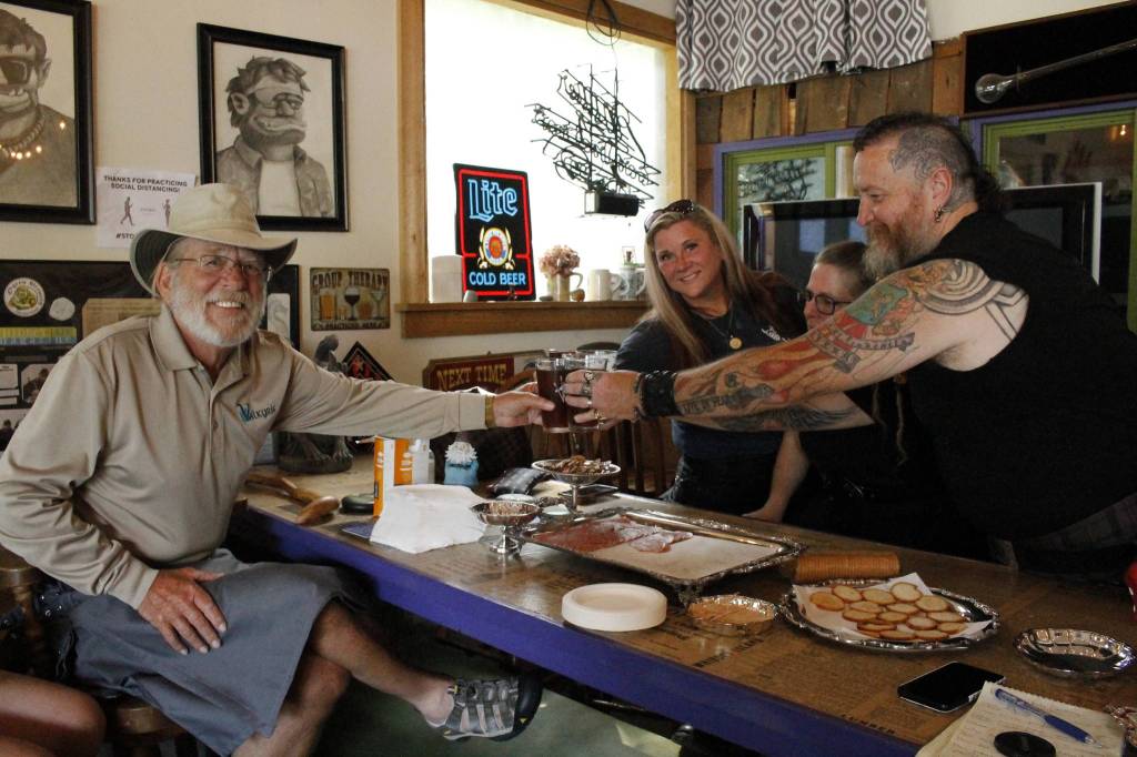 Photo by Kira Erickson/South Whidbey Record
From left to right, Craig Swanson, Cindi Crowder Rausch, Aimee Shand and Bexar ORiley partake in a beer, while wearing kilts, at Ogres Brewing in Clinton.