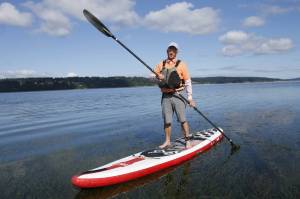Freeland resident Kevin Lungren has been commuting to the office using his paddleboard. Its a commute he can do in all seasons and just about any type of weather, except wind. (Photo by Kira Erickson/South Whidbey Record)