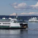 Andy Bronson/Everett Herald file photo
Ferries pass on a crossing between Mukilteo and Whidbey Island.