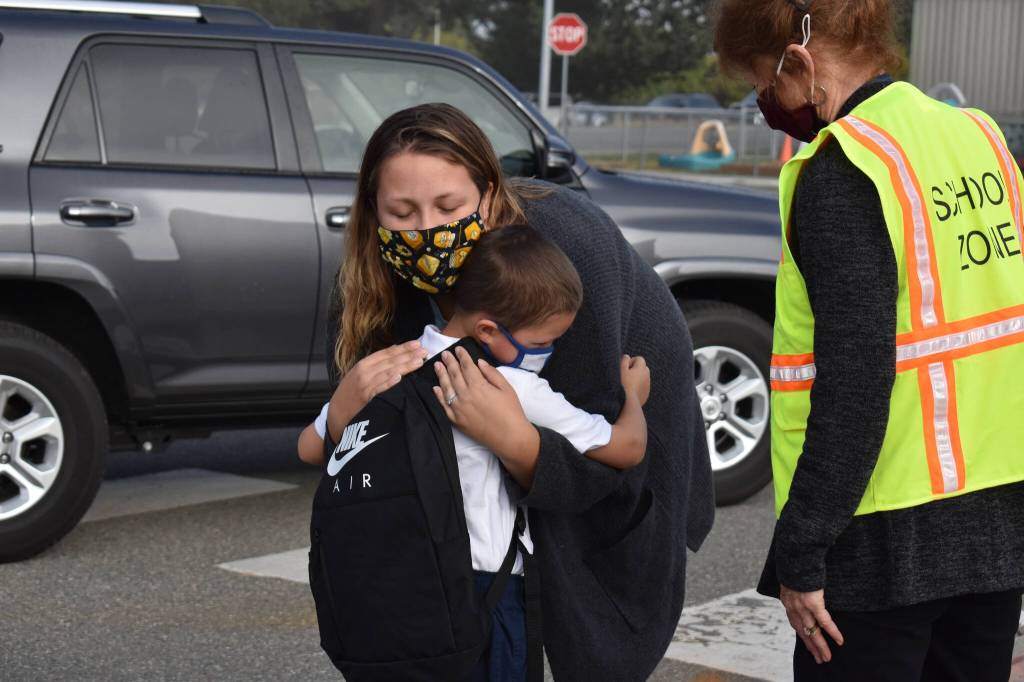 Photo by Emily Gilbert/Whidbey News-Times
Dalton Taranenko hugs his mom Hayley Barrow goodbye before heading to his first day of second grade at Oak Harbor Elementary on Sept. 9. .
