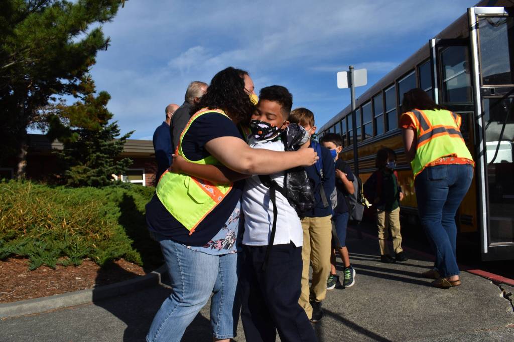 Photos by Emily Gilbert/Whidbey News-Times
Above, incoming third grader Josiah Moore was all smiles from the moment he stepped off the bus on the first day of school at Oak Harbor Elementary.