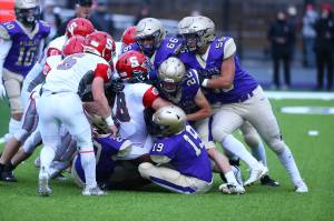 Photo by John Fisken
Oak Harbor Wildcats go after the ball during the homecoming football game against the Stanwood Spartans Sept. 17. The Wildcats lost 34-14.