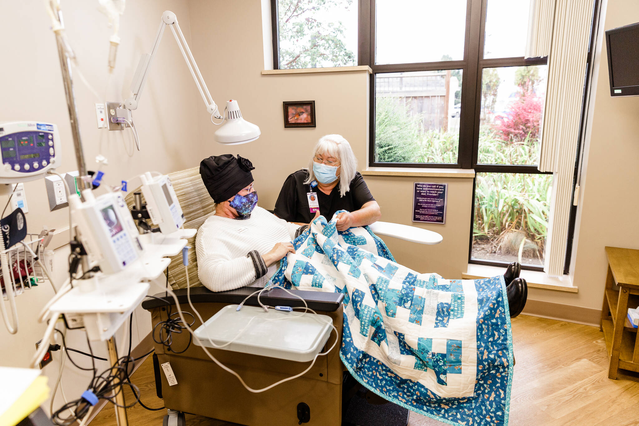 Dawn Sellgren, RN, cares for a patient at WhidbeyHealth Cancer Care. (Photo provided)
