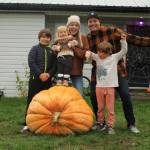 Photo by Karina Andrew/Whidbey News-Times
Courtnie Deckwa, James Cardinal and their children, Aiden, 10, Matilda, 1, and Kai, 6, pose with their prize.