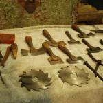 Tools used for patching plywood were recently discovered by South End picker John Norris. They could be over a century old, and include chisels, razors, nails and a hammer. (Photo by Kira Erickson/South Whidbey Record)