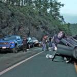 Photo provided
A car rolled over south of Deception Pass and struck several parked cars. It was the second car accident in the area on Sunday.