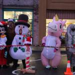 Photo by Karina Andrew/Whidbey News-Times
Santa brought an unusual gaggle of helpers with him from the North Pole to the Oak Harbor tree lighting, including Mickey Mouse, Sasquatch, a walking snowman, a pink unicorn and a squirrel.