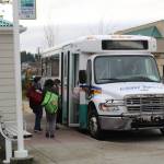Photo by Karina Andrew / Whidbey News Group
Riders board an Island Transit bus at the transit station in Oak Harbor.