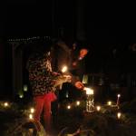 Photo by Karina Andrew/Whidbey News-Times
Visitors light their candles in the center of the spiral.
