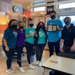 Photo provided
From left, Thinalyn Ramier, Ainsley Nelson, Isadora White, Erica Schulle, Kyle Hucko and Charles Brooks receive the Spotlight Award from the Association of Washington Student Leaders for hosting the 2021 conference.