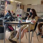 Senior Annie Salinger listens during a leadership class at Oak Harbor High School after students returned to school. (File photo by Emily Gilbert/Whidbey News-Times)