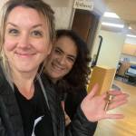 Photo provided
Carla Dozier, right, hands off the keys of her salon to its new owner, Aaron Wiley.