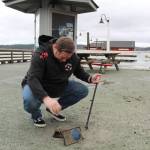 Photo by Karina Andrew/Whidbey News-Times
Chris Michalopoulos turns off the water to the wharf.