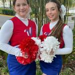 Photo provided
Cassidy Gore, left, and Ava Vallencourt get ready for their pregame performance at the Citrus Bowl.