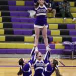Photo provided
Cassidy Gore, bottom left, and Ava Vallencourt, top, cheer at a basketball game.